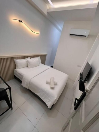 Imagen de la habitación del Hotel One Point TT3 Tabuan Tranquility. Foto 6
