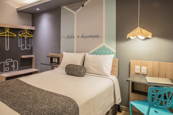 Imagen de la habitación del Hotel One Puebla Angelópolis Periférico. Foto 8