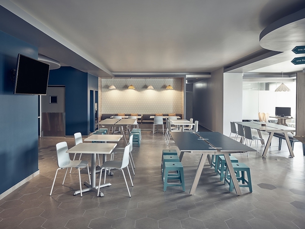 Imagen del bar/restaurante del Hotel One Puebla Angelópolis Periférico. Foto 3