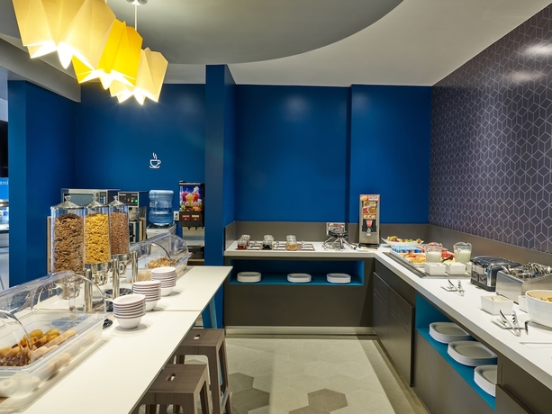 Imagen del bar/restaurante del Hotel One Puebla Angelópolis Periférico. Foto 4