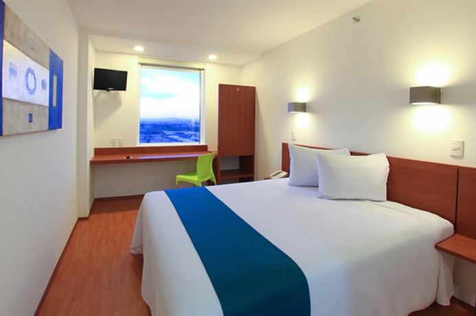 Imagen de la habitación del Hotel One Querétaro Aeropuerto. Foto 9