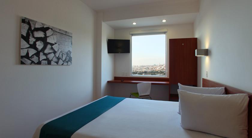 Imagen de la habitación del Hotel One Quer&eacute;taro Centro Sur. Foto 3