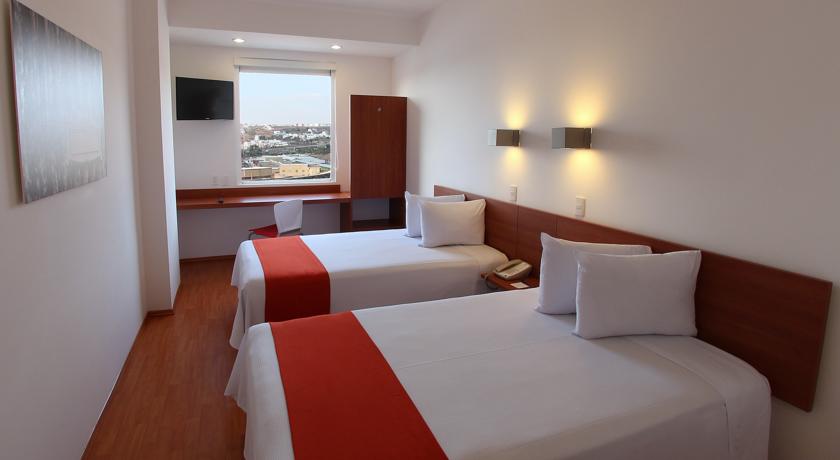 Imagen de la habitación del Hotel One Quer&eacute;taro Centro Sur. Foto 4