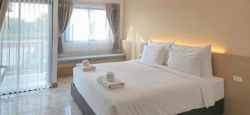 Imagen de la habitación del Hotel One Sakon Nakhon. Foto 15