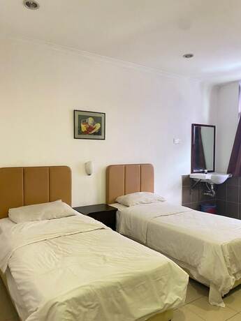 Imagen de la habitación del Hotel One Stop. Foto 15