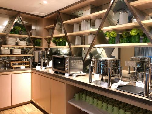 Imagen de la habitación del Hotel One Sunland Serviced Suites Managed By Lanson Place. Foto 6