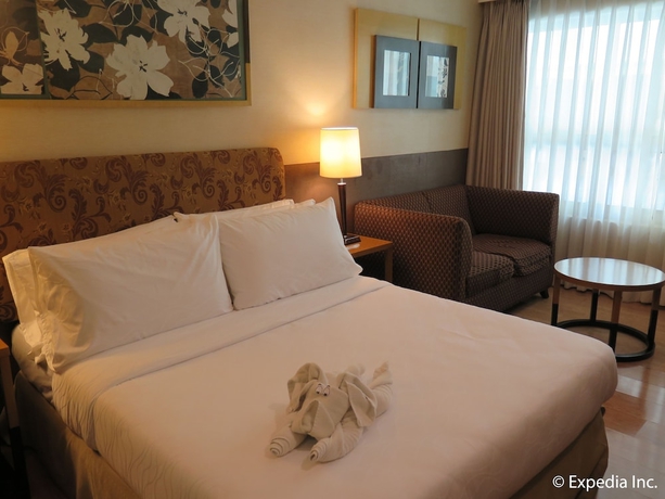 Imagen de la habitación del Hotel One Tagaytay Place. Foto 2
