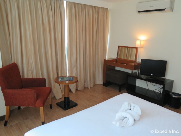 Imagen de la habitación del Hotel One Tagaytay Place. Foto 5