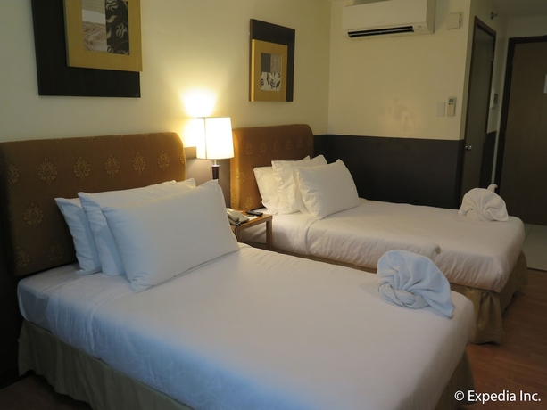 Imagen de la habitación del Hotel One Tagaytay Place. Foto 7