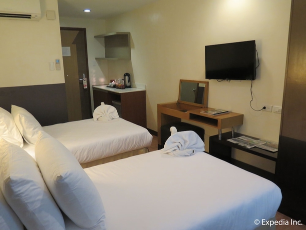 Imagen de la habitación del Hotel One Tagaytay Place. Foto 10