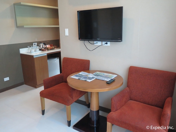 Imagen de la habitación del Hotel One Tagaytay Place. Foto 11