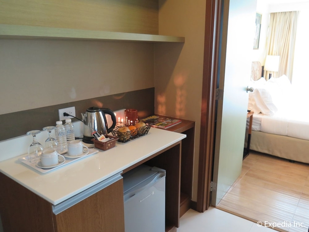 Imagen de la habitación del Hotel One Tagaytay Place. Foto 13