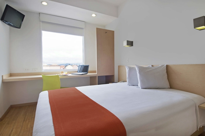 Imagen de la habitación del Hotel One Toluca Aeropuerto. Foto 4