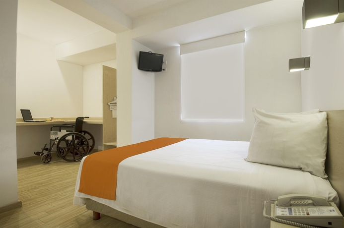 Imagen de la habitación del Hotel One Toluca Aeropuerto. Foto 7