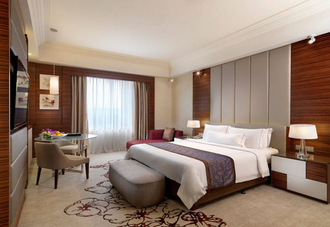 Imagen de la habitación del Hotel One World. Foto 11