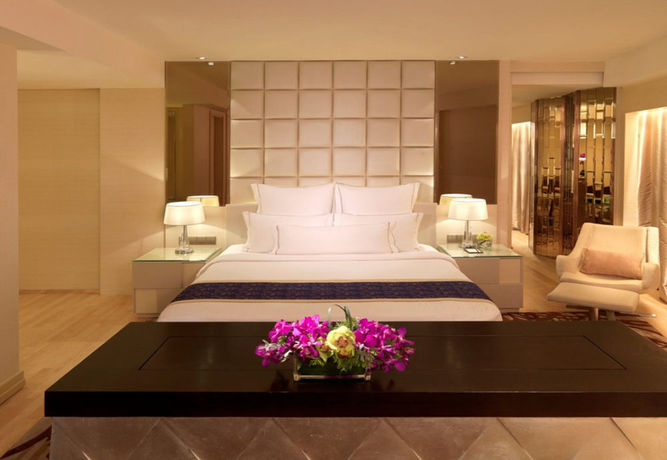 Imagen de la habitación del Hotel One World. Foto 14