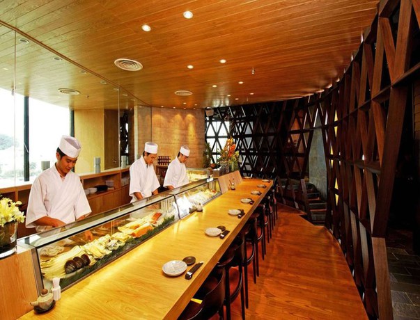 Imagen del bar/restaurante del Hotel One World. Foto 4