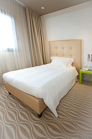 Imagen de la habitación del Hotel One and Restaurant. Foto 7