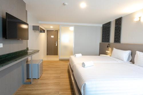 Imagen de la habitación del Hotel วัน บัดเจท ตาก แม่สอด - One budget hotel Tak Maesot. Foto 19