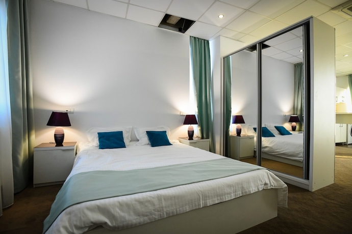 Imagen de la habitación del Hotel One88 Apartments. Foto 17