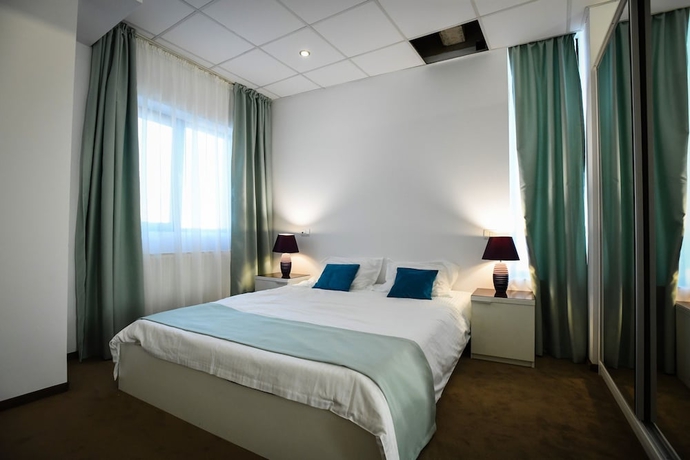 Imagen de la habitación del Hotel One88 Apartments. Foto 18