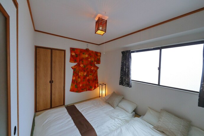 Imagen de la habitación del Hotel Onehome Inn Apartment In Tennouji. Foto 17