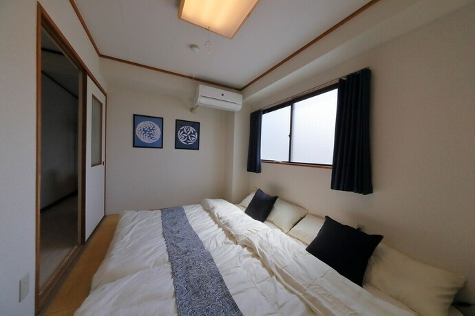 Imagen de la habitación del Hotel Onehome Inn Apartment In Tennouji. Foto 22