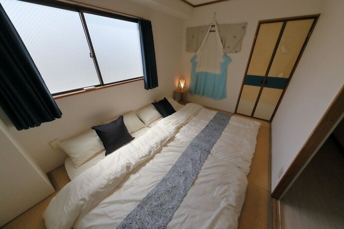 Imagen de la habitación del Hotel Onehome Inn Apartment In Tennouji. Foto 23