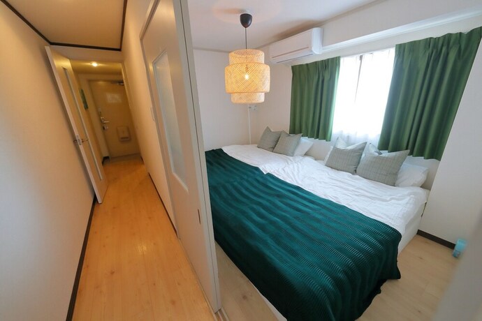 Imagen de la habitación del Hotel Onehome Inn Apartment In Tennouji. Foto 27