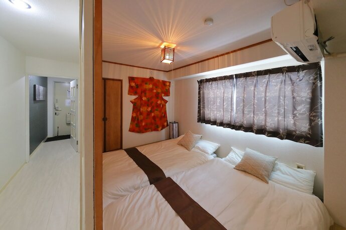 Imagen de la habitación del Hotel Onehome Inn Apartment In Tennouji. Foto 30