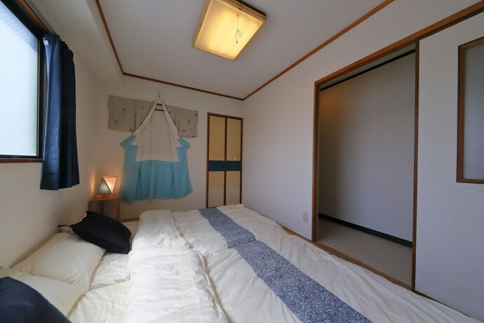Imagen de la habitación del Hotel Onehome Inn Apartment In Tennouji. Foto 36