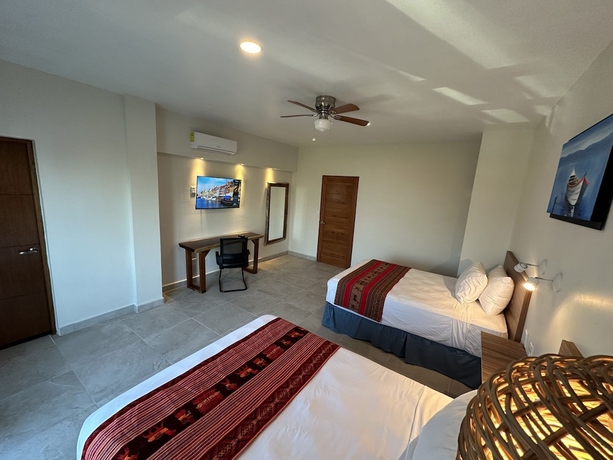 Imagen de la habitación del Hotel Oneiro Suites. Foto 12