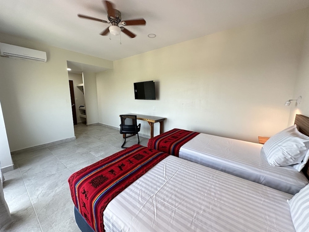 Imagen de la habitación del Hotel Oneiro Suites. Foto 15