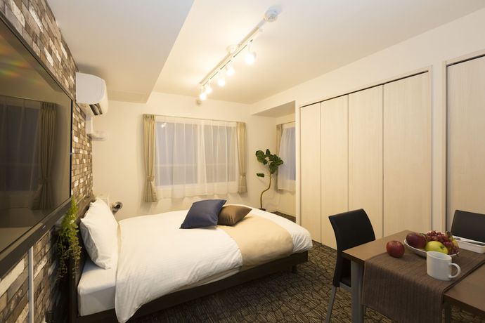 Imagen de la habitación del Hotel One's Residence. Foto 2