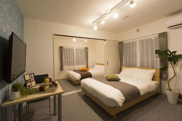 Imagen de la habitación del Hotel One's Residence. Foto 19