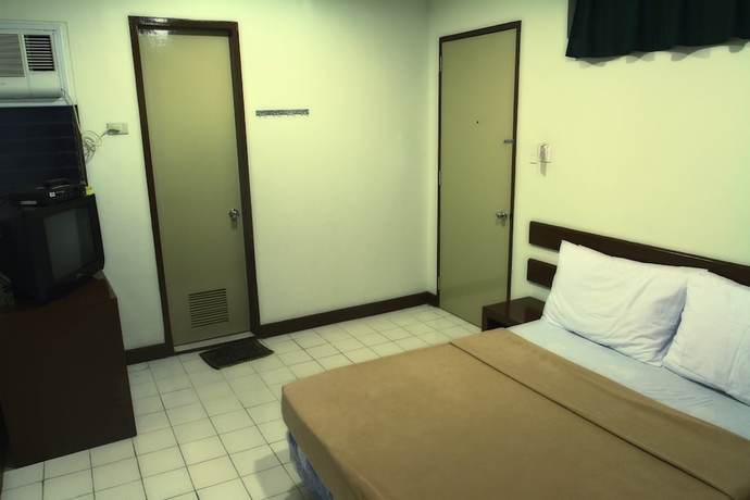 Imagen de la habitación del Hotel Ong Bun Pension House Bacolod. Foto 5
