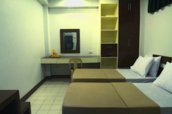 Imagen de la habitación del Hotel Ong Bun Pension House Bacolod. Foto 9