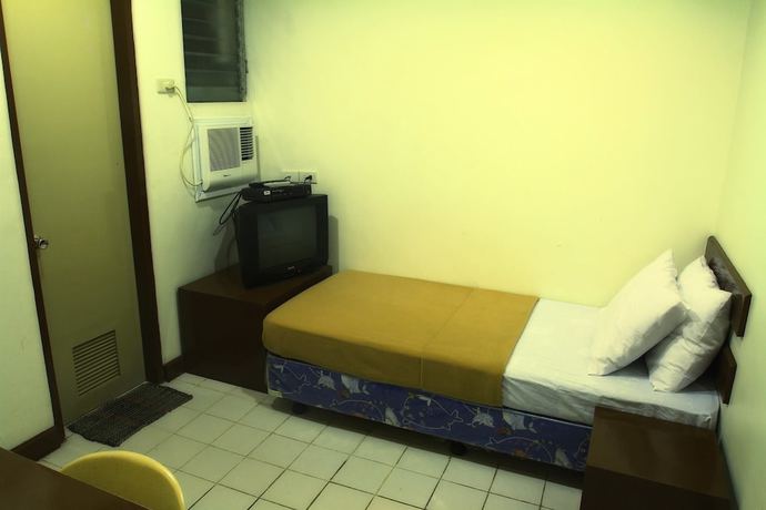 Imagen de la habitación del Hotel Ong Bun Pension House Bacolod. Foto 10
