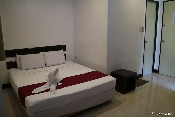 Imagen de la habitación del Hotel Ong Bun Pension House. Foto 7
