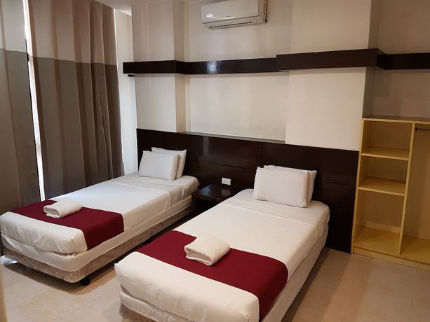 Imagen de la habitación del Hotel Ong Bun Pension House. Foto 8