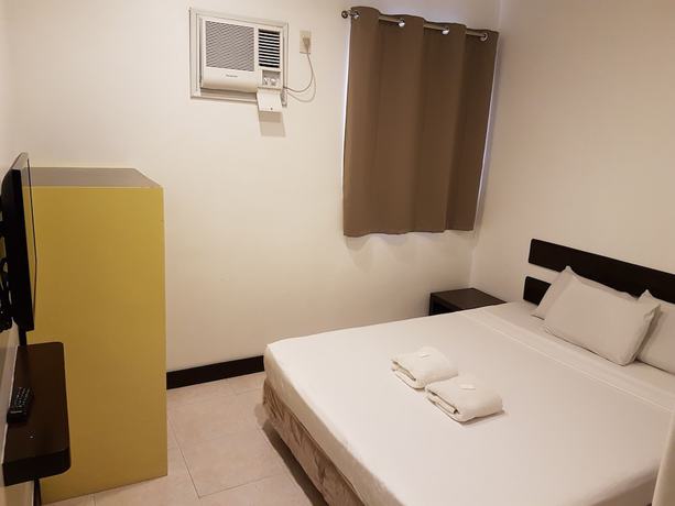 Imagen de la habitación del Hotel Ong Bun Pension House. Foto 14