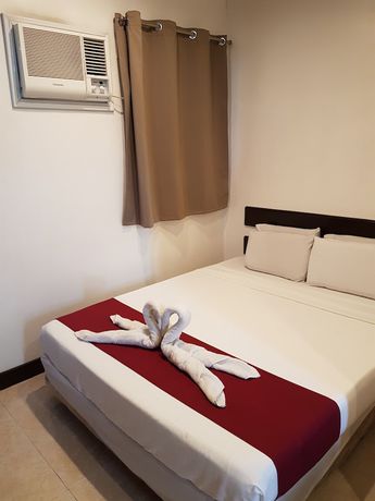 Imagen de la habitación del Hotel Ong Bun Pension House. Foto 17