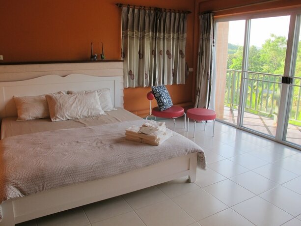 Imagen de la habitación del Hotel Onhill Village. Foto 34
