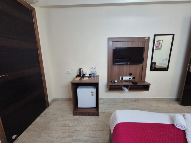 Imagen de la habitación del Hotel OnlyStay Luxe House Golf Course Road. Foto 5