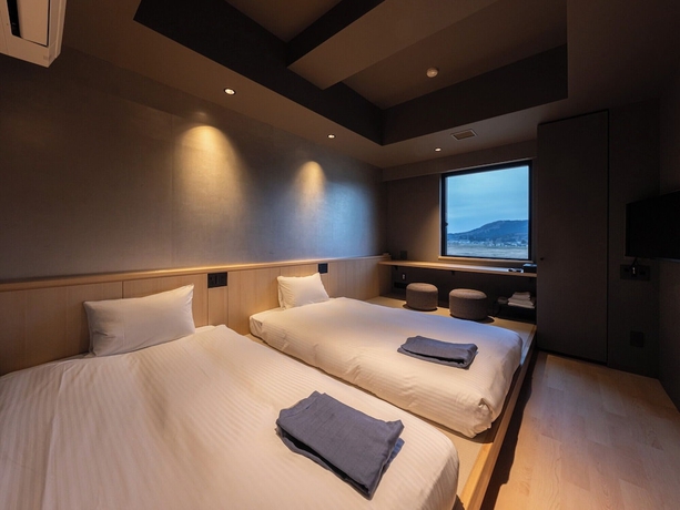 Imagen de la habitación del Hotel Onn Oomagarinohanabi, Daisen. Foto 4