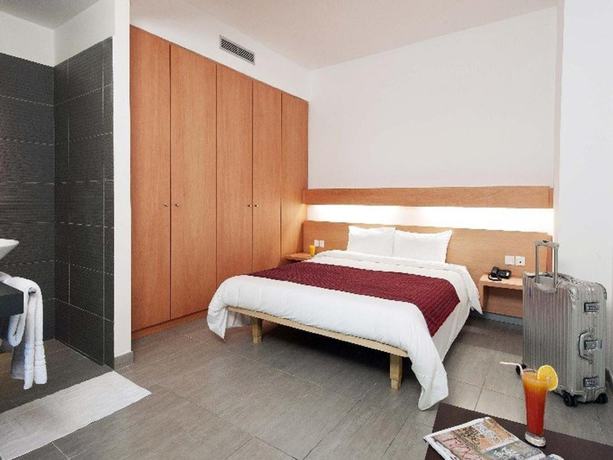 Imagen de la habitación del Hotel Onomo Abidjan Airport. Foto 9