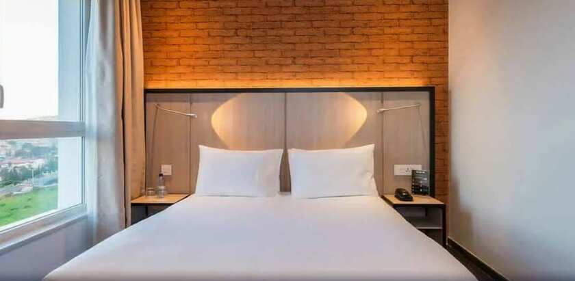 Imagen de la habitación del Hotel Onomo Kigali. Foto 21