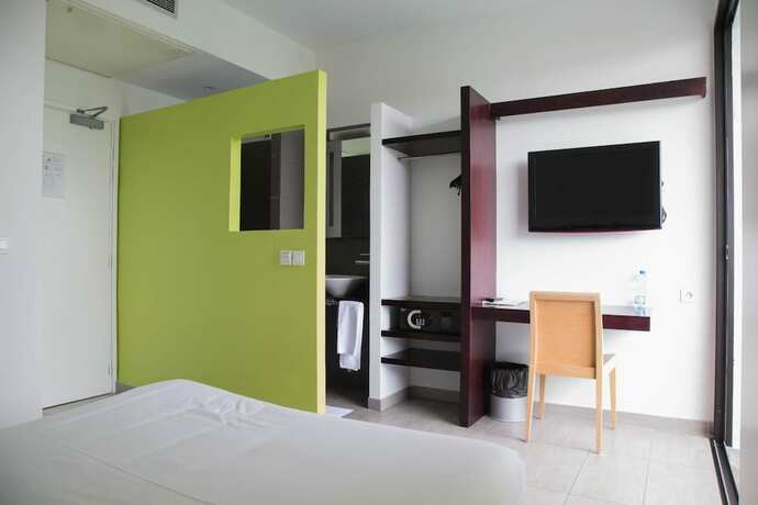 Imagen de la habitación del Hotel Onomo Libreville. Foto 23