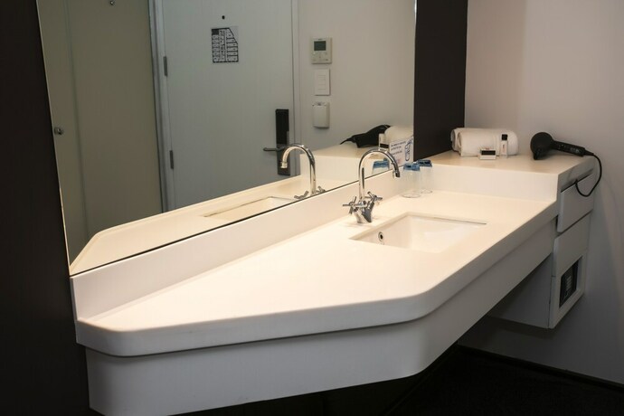 Imagen de la habitación del Hotel Onomo Waterfront. Foto 28