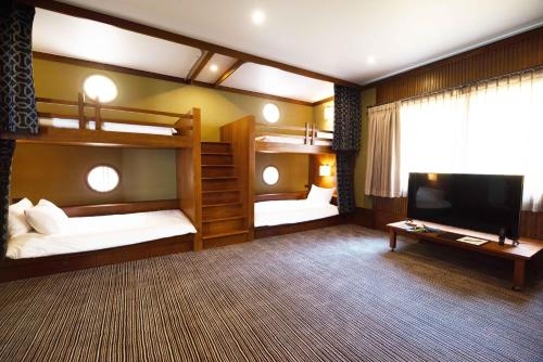 Imagen de la habitación del Hotel Onsen At Moncham. Foto 8